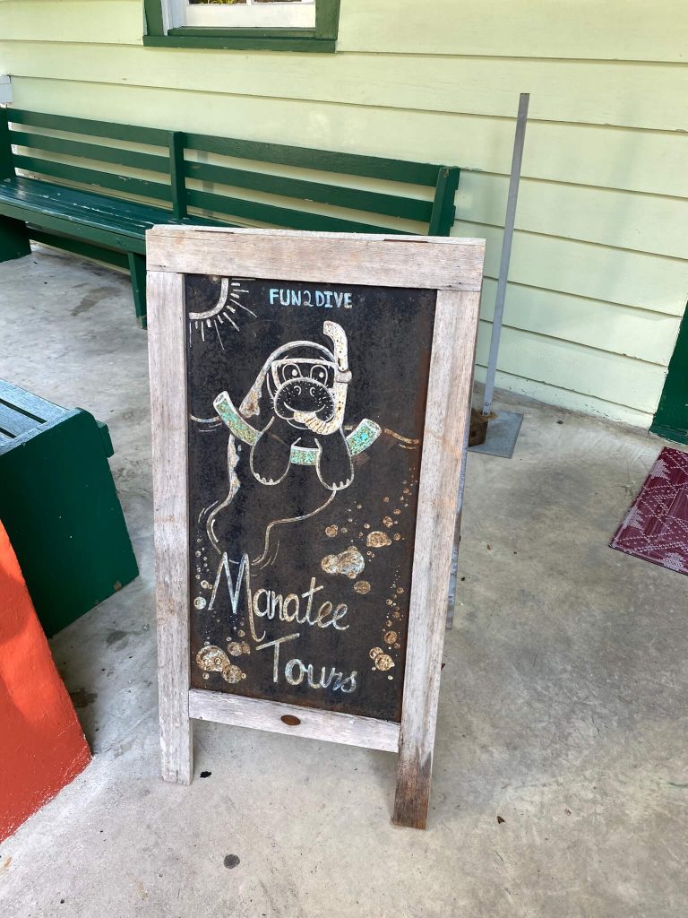 swimming with manatees tour sign florida